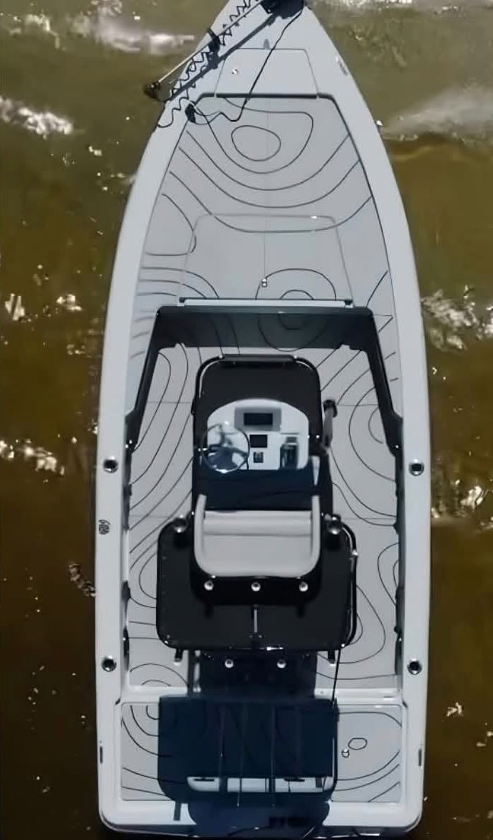 Top-down view of a center console boat with gray topo-pattern foam decking